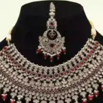 Stunning red and white stone-studded bridal necklace set