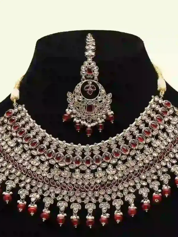 Stunning red and white stone-studded bridal necklace set