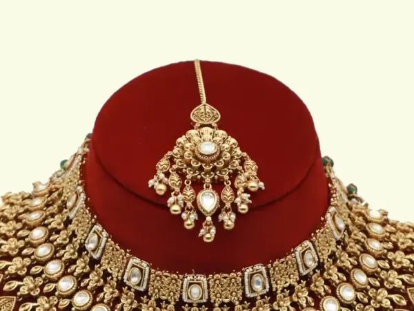 Heavy bridal brass choker necklace set with earrings and maang tikka in antique gold finish