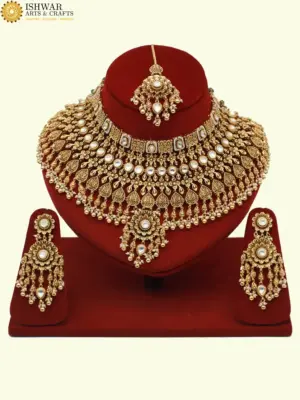 Heavy bridal brass choker necklace set with earrings and maang tikka in antique gold finish, Ishwar Arts and Crafts