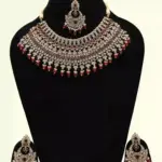 Stunning red and white stone-studded bridal necklace set