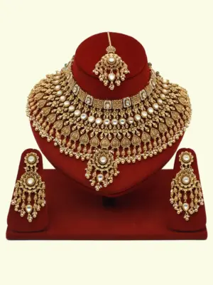 Heavy bridal brass choker necklace set with earrings and maang tikka in antique gold finish